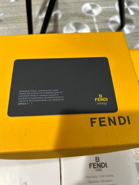 7055. Fendi Swiss Made White Ceramic FF Logo Watch Full Set Box Papers Working